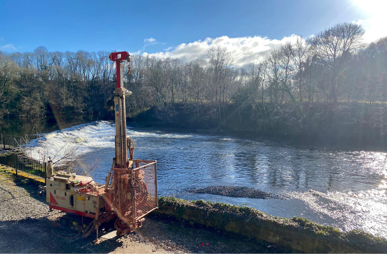 Drilling rig next to river